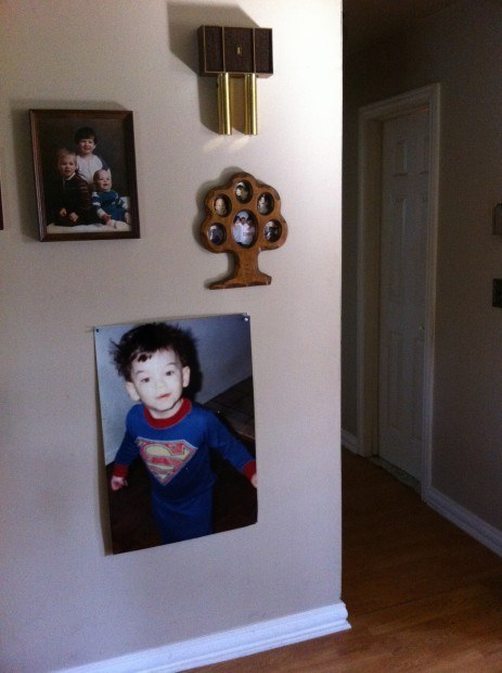 A picture of Tim in his superhero outfit, hanging in his mother’s house. Photo courtesy Tim Manley.