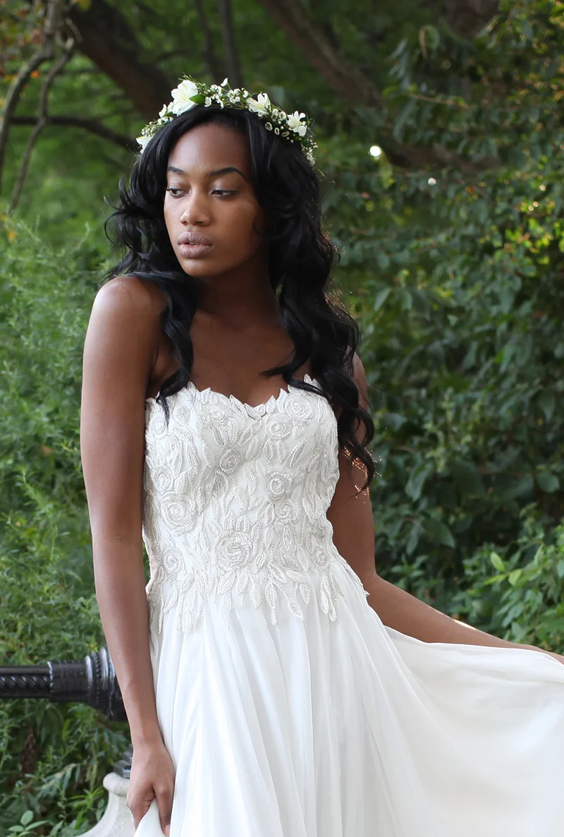 The bodice is fully beaded and embroidered by hand, imagine the hours gone into making this dress!