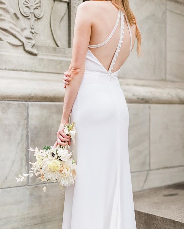 With the back on our silk crepe Clio gown, you&rsquo;d never think a minimalist gown wasn&rsquo;t memorable. .
.
.

Photo: @lovedanielleoh 
Model: @josefineesvensson 
Florals: @laurel.society 
#bridalbouquet #fallbride #nybride #coolbride #bohobride 