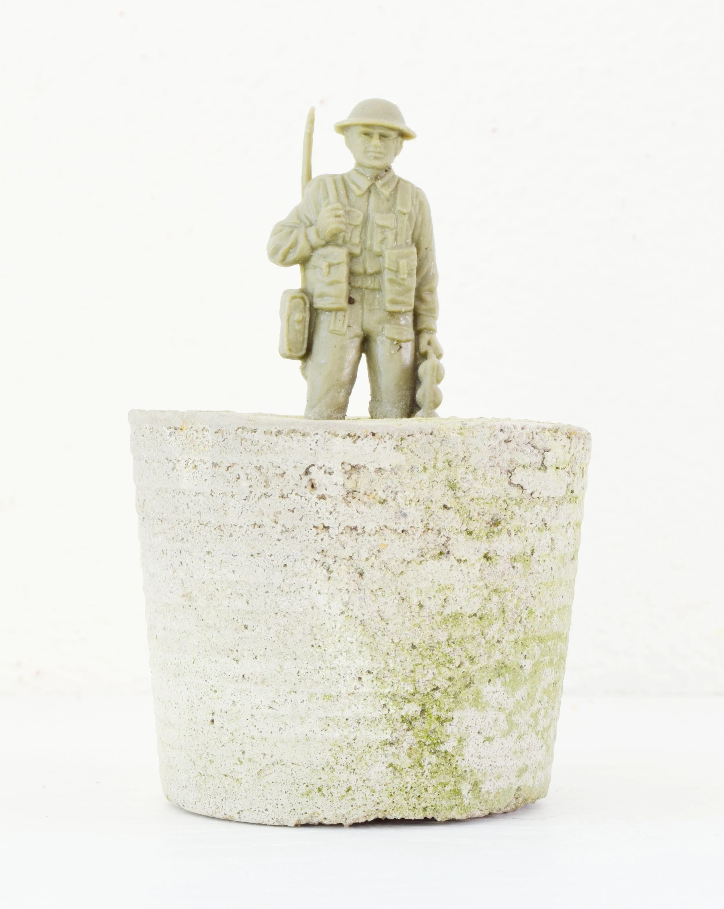 'COMMUTE' 2014 Concrete and plastic soldier 10 x 5 x 2 cm