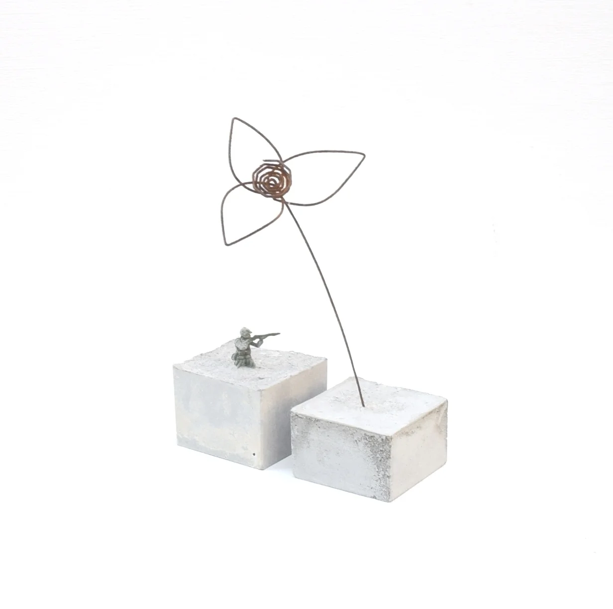 'UNTITLED' 2016 Concrete, plastic soldier and rusted metal 10 x 5 x 2 cm