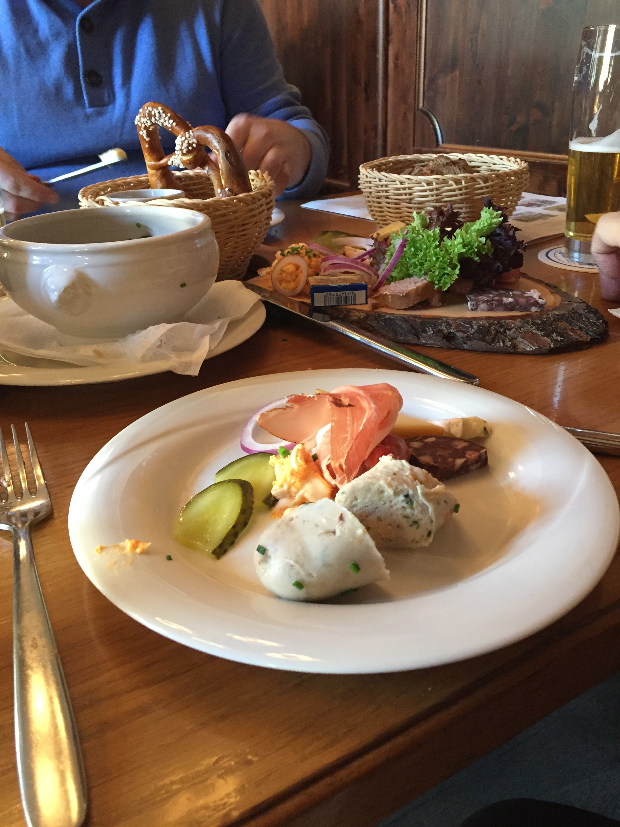 Our pub lunch of sausage, pickles, pretzels and beer