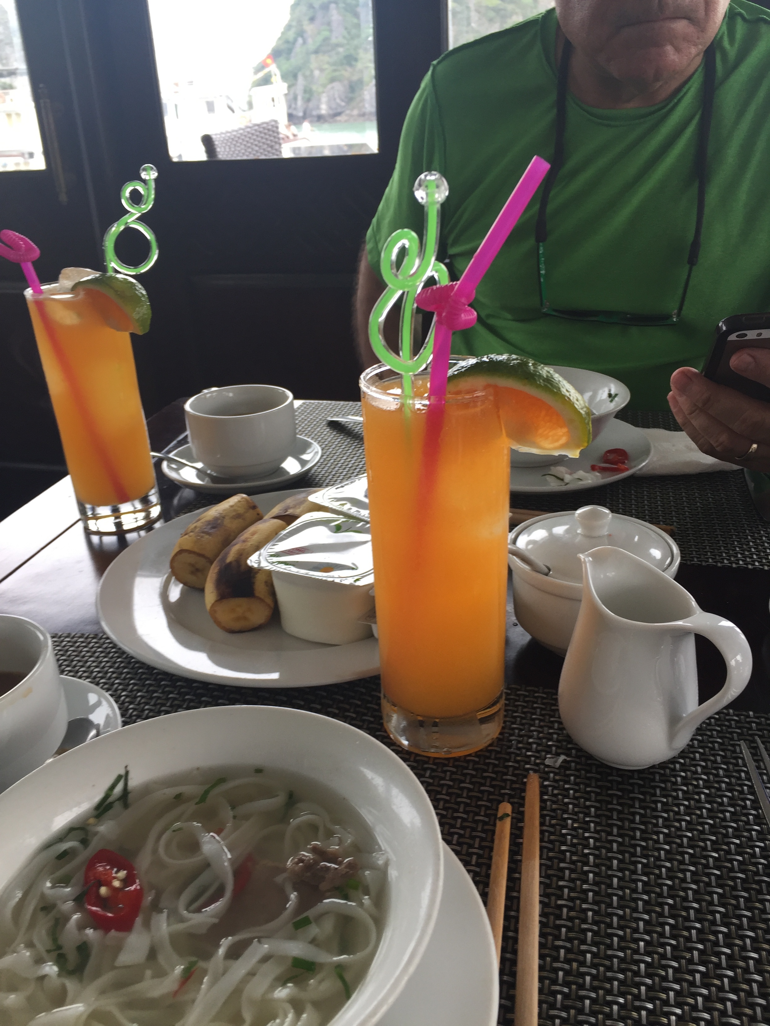Breakfast of noodles and fresh juice