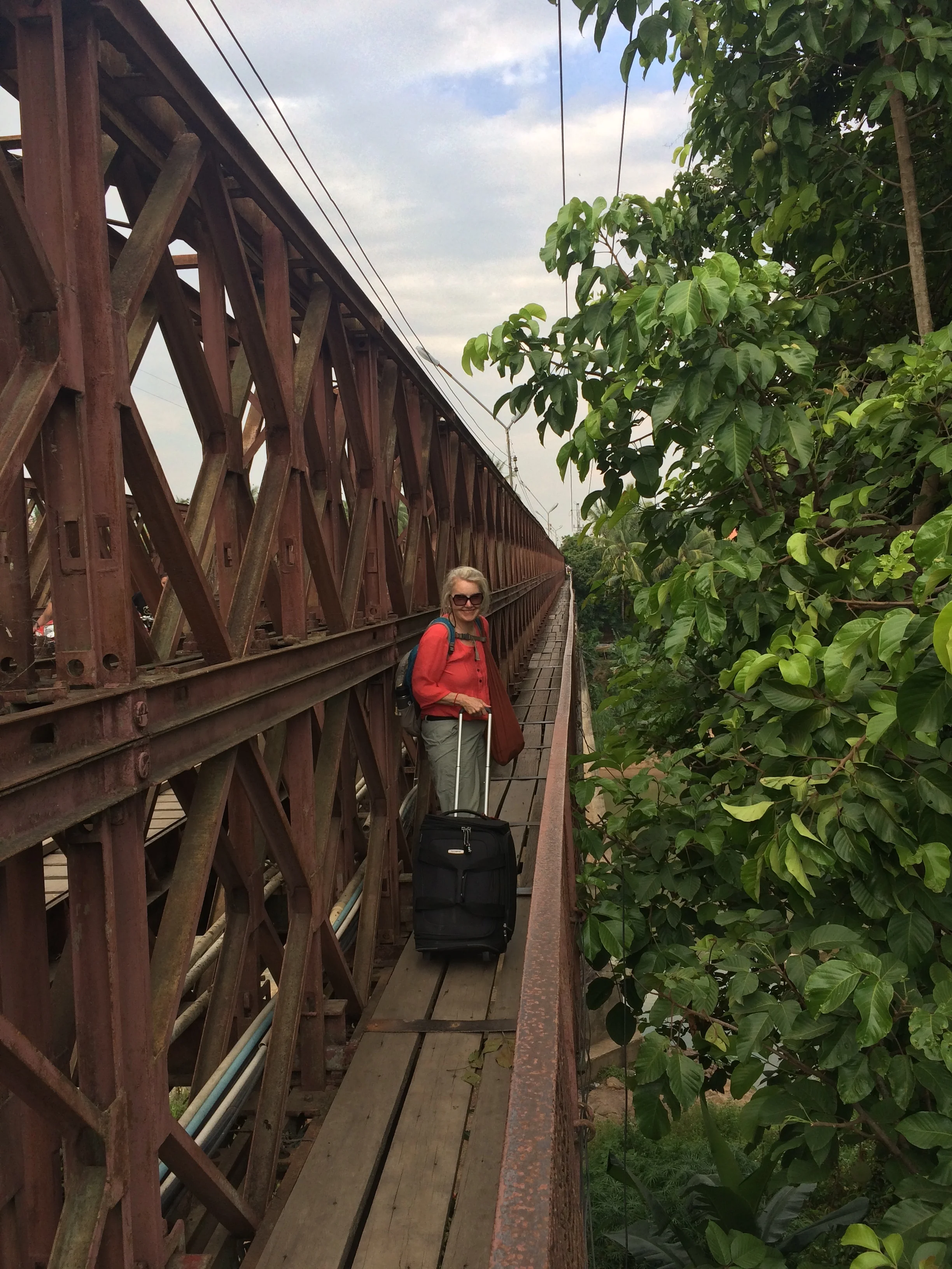 Our walk to the hotel including crossing this old bridge with our luggage