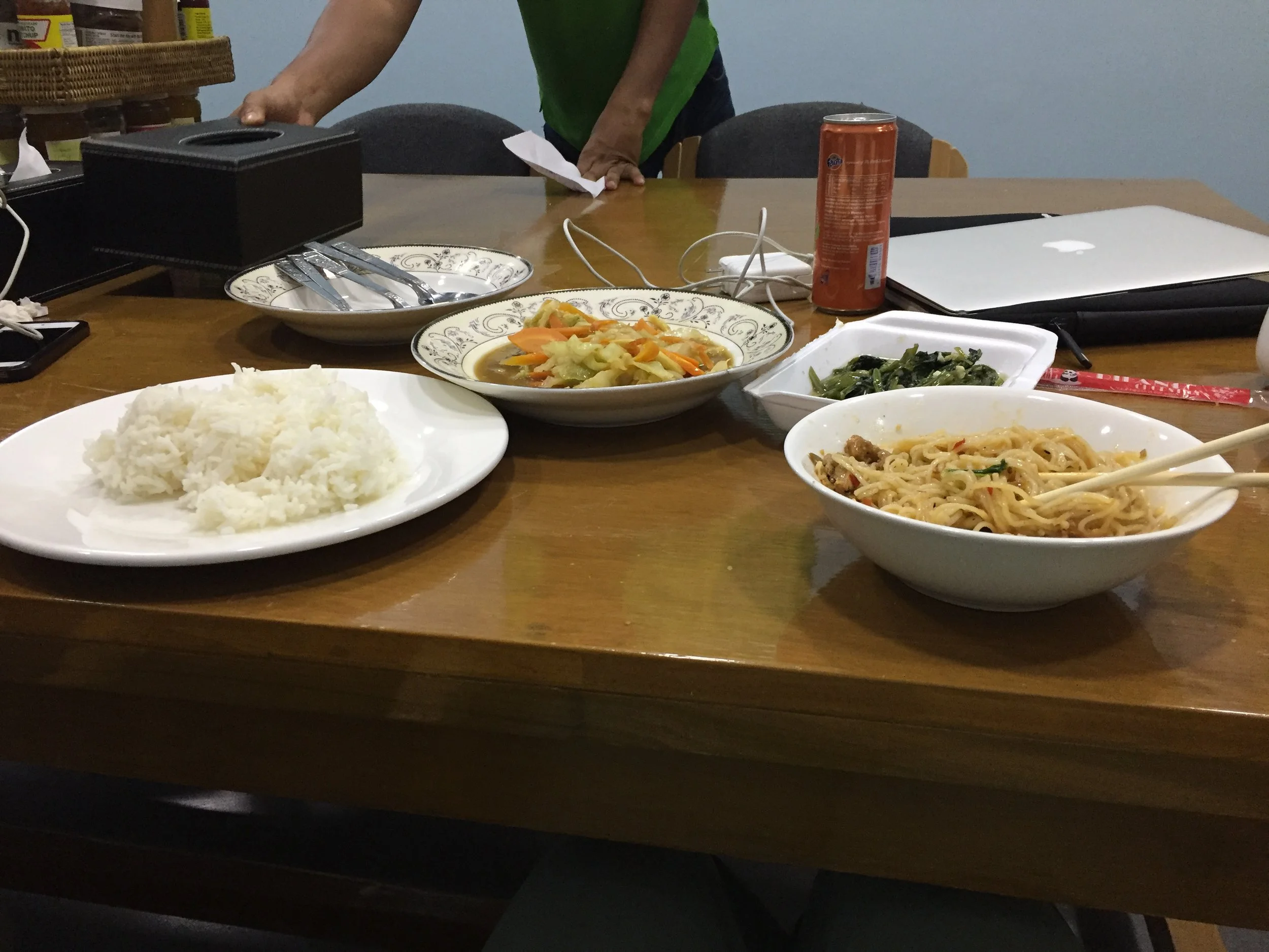 Simple meal of noodles, greens and rice from our hostel