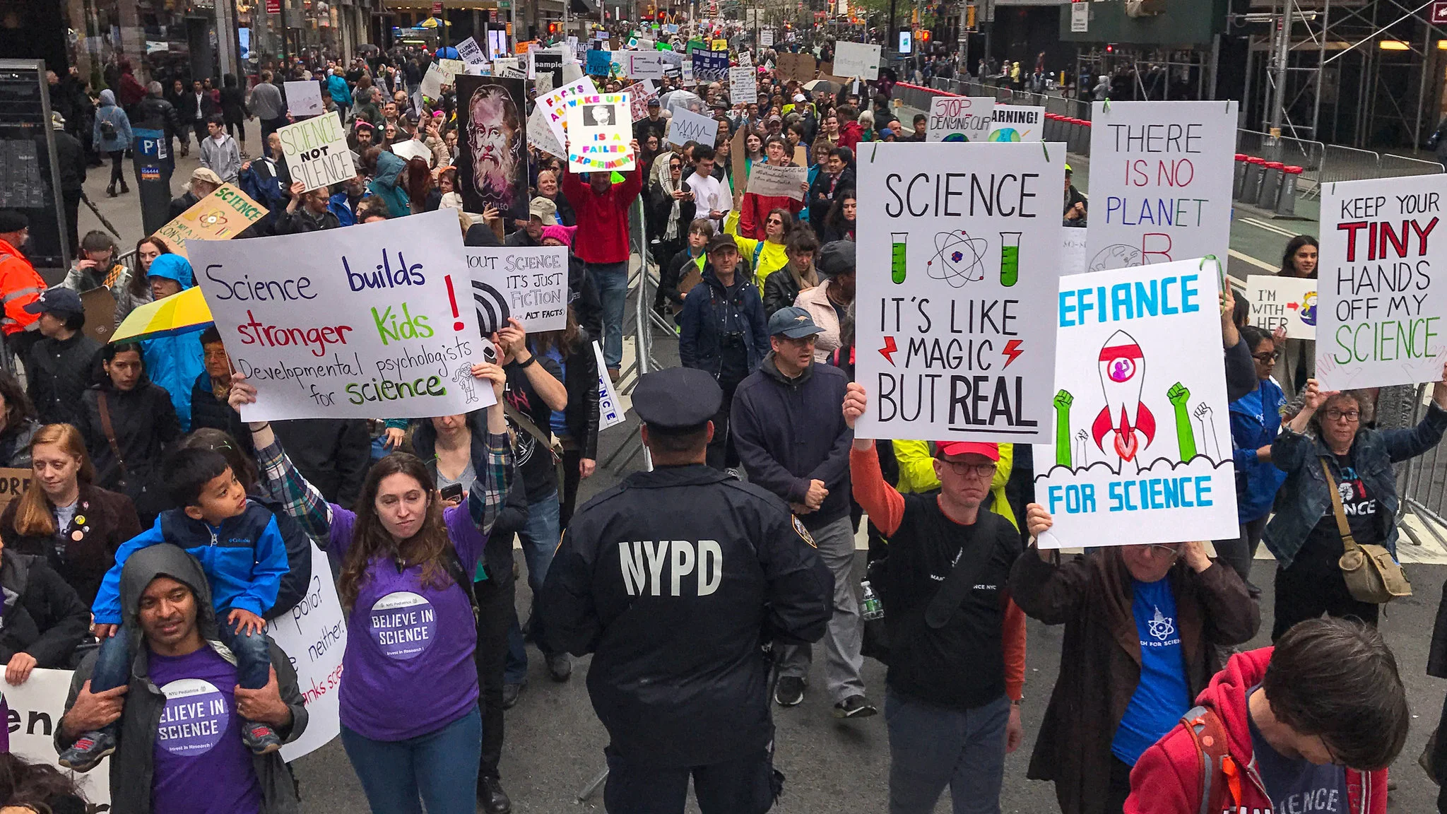 Yours truly holding the "SCIENCE: it's like magic but real" sign.