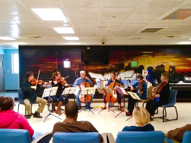 Sarasa musicians performing for a residency in a local Juvenile Facility