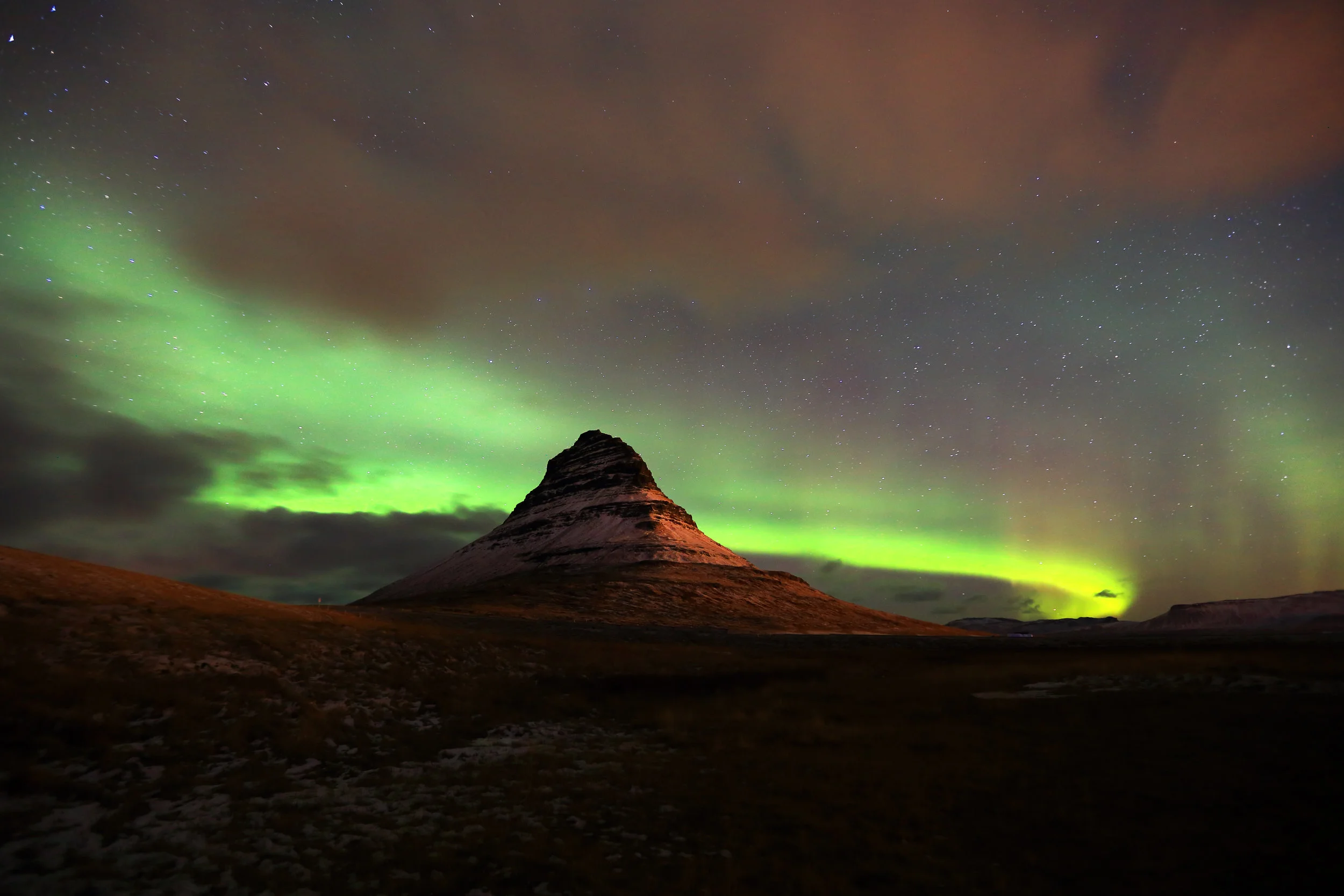 Aurora borealis dancing over Kirkjufell