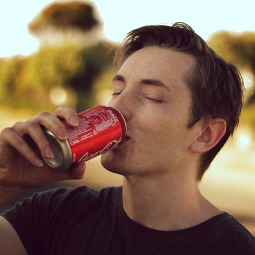 Linus Nelson enjoying a cold cola-type drink