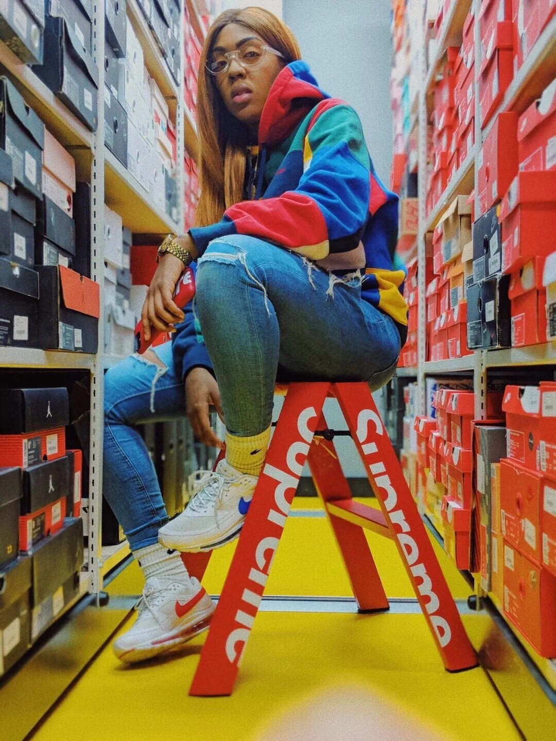 Elle Sneaks in stock room rocking the Skepta Nike SK Air 2 at Presented By. Photo Credit Elle Sneaks Instagram
