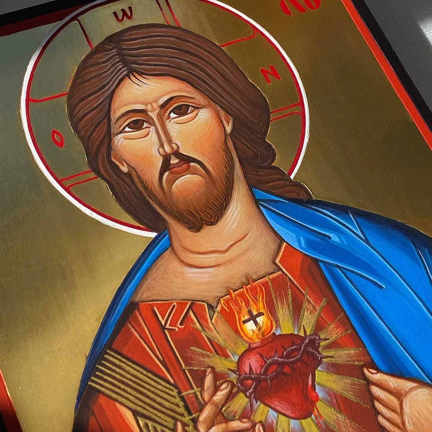 June is the month of the Sacred Heart of Jesus, and it&rsquo;s fitting that I&rsquo;ve just completed this icon of the Sacred Heart. The devotion to the Sacred Heart of Jesus is a spiritual practice focused on the compassionate love of Christ symboli