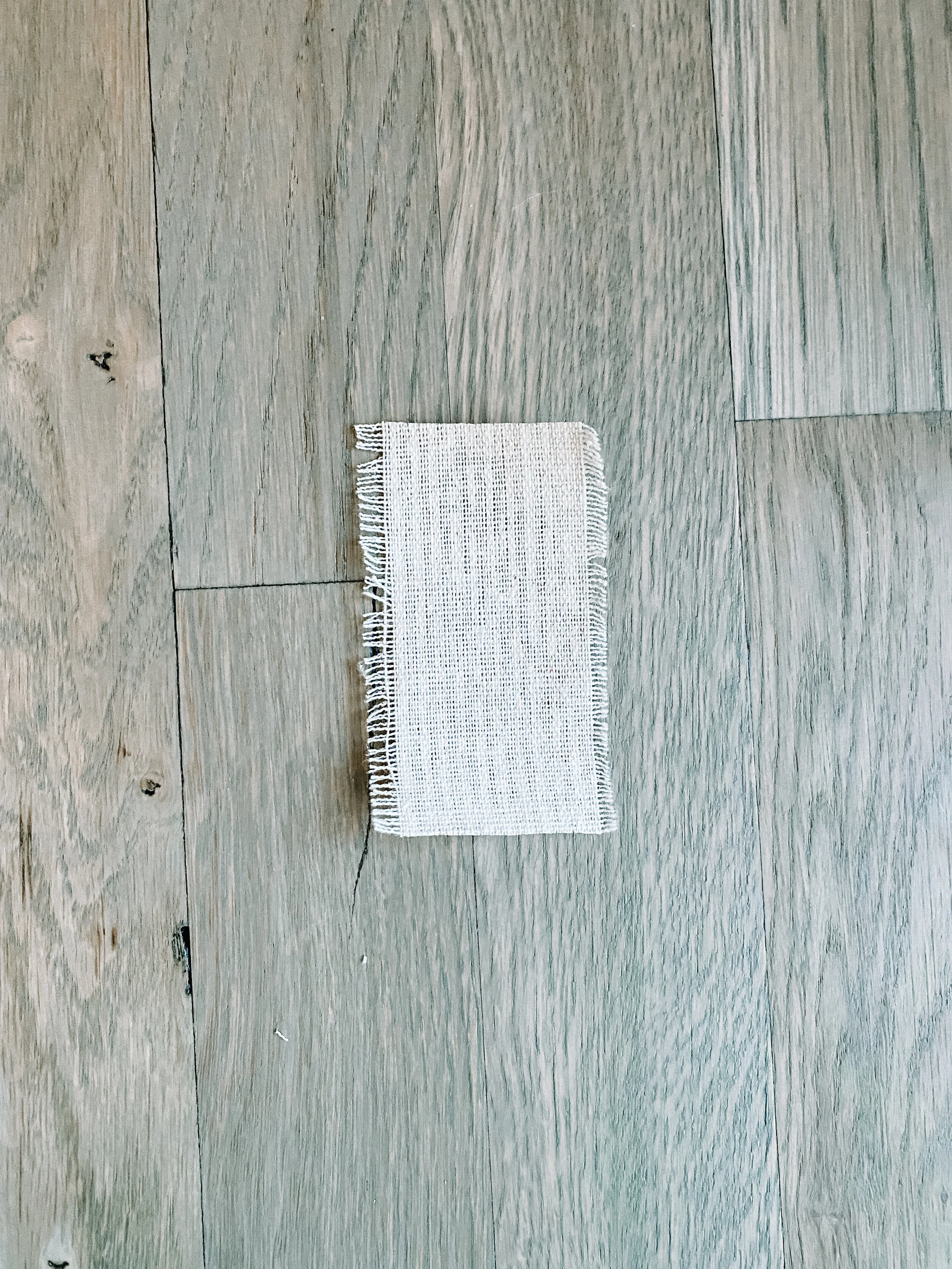  Cut a 2-3 inch strip of ribbon and turn it face side down. 