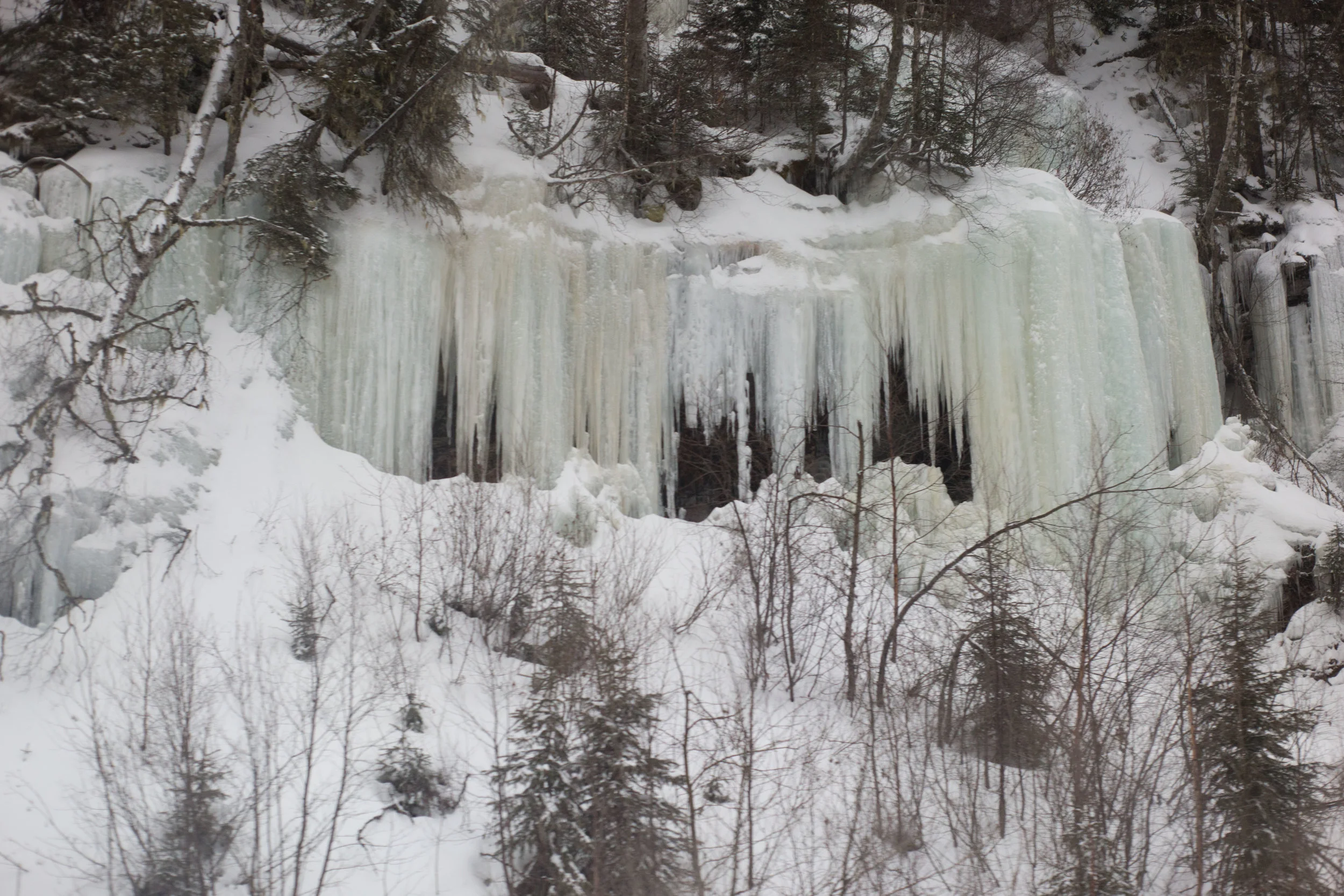  This is a common sight all along the road for many months out of the year, frozen streams along the rocks. 