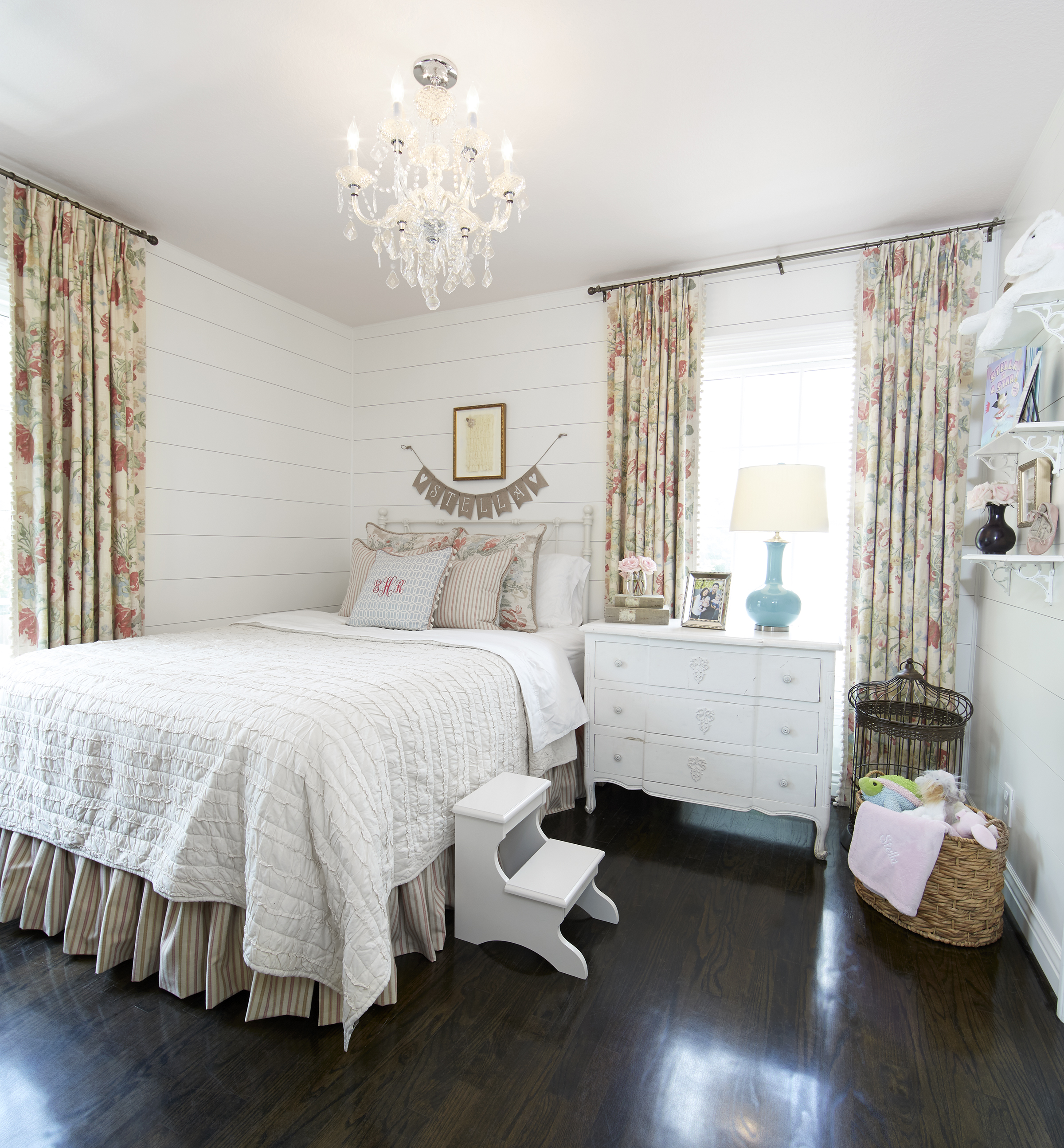 Each room in the house has a cohesive farmhouse feel, with slight variations to reflect the personalities of family member. With floral accents and a chic chandelier, daughter Stella's bedroom offers a shabby elegant spin farmhouse style.