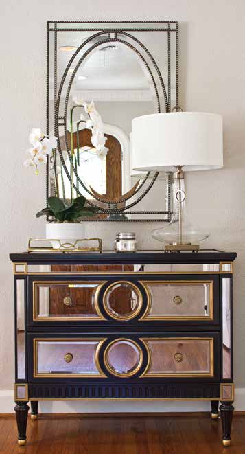The Pearsons needed ample, durable seating for their high-traffic living room, but they also wanted the designers’ signature light, bright fabrics. Neutral tones enhanced the room, while custom pillows and pops of black and brass added perfect doses of preppy and modern style.