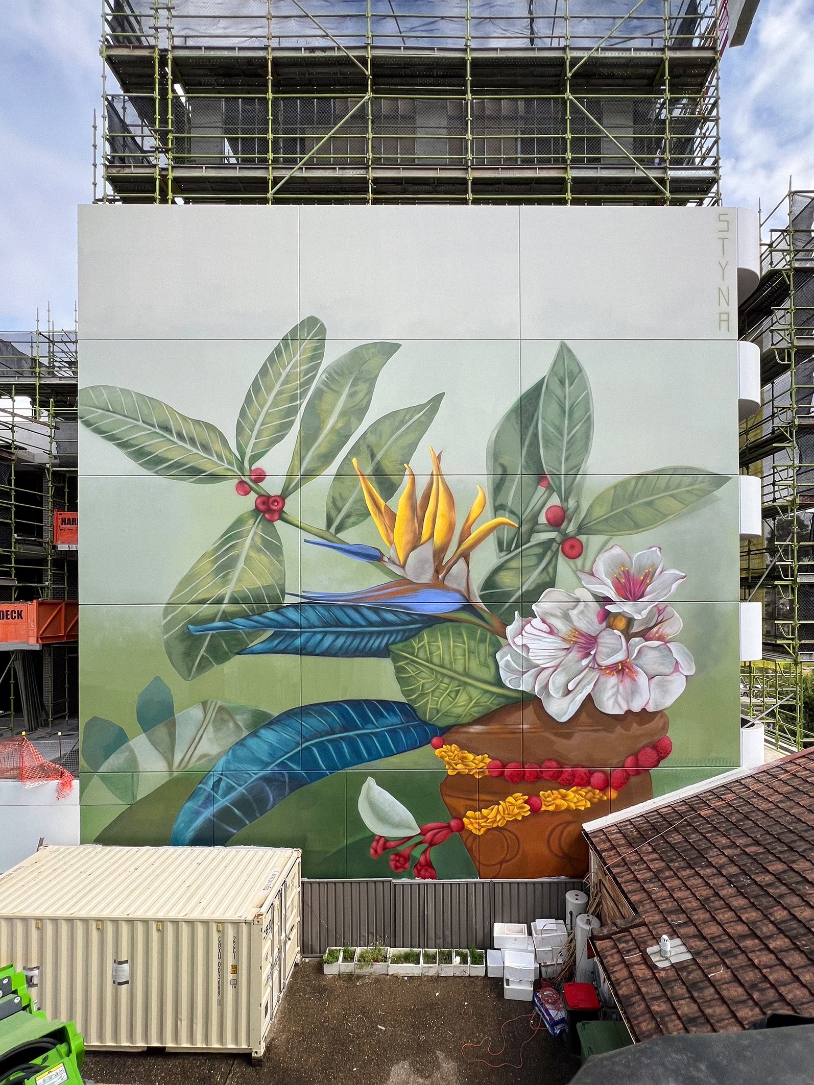 Painted mural of Birds of Paradise and Indian Hawthorn flower in ceramic pot with garlands of marigolds, by Christina Huynh STYNA for ARTSCAPE and Oscar George Projects