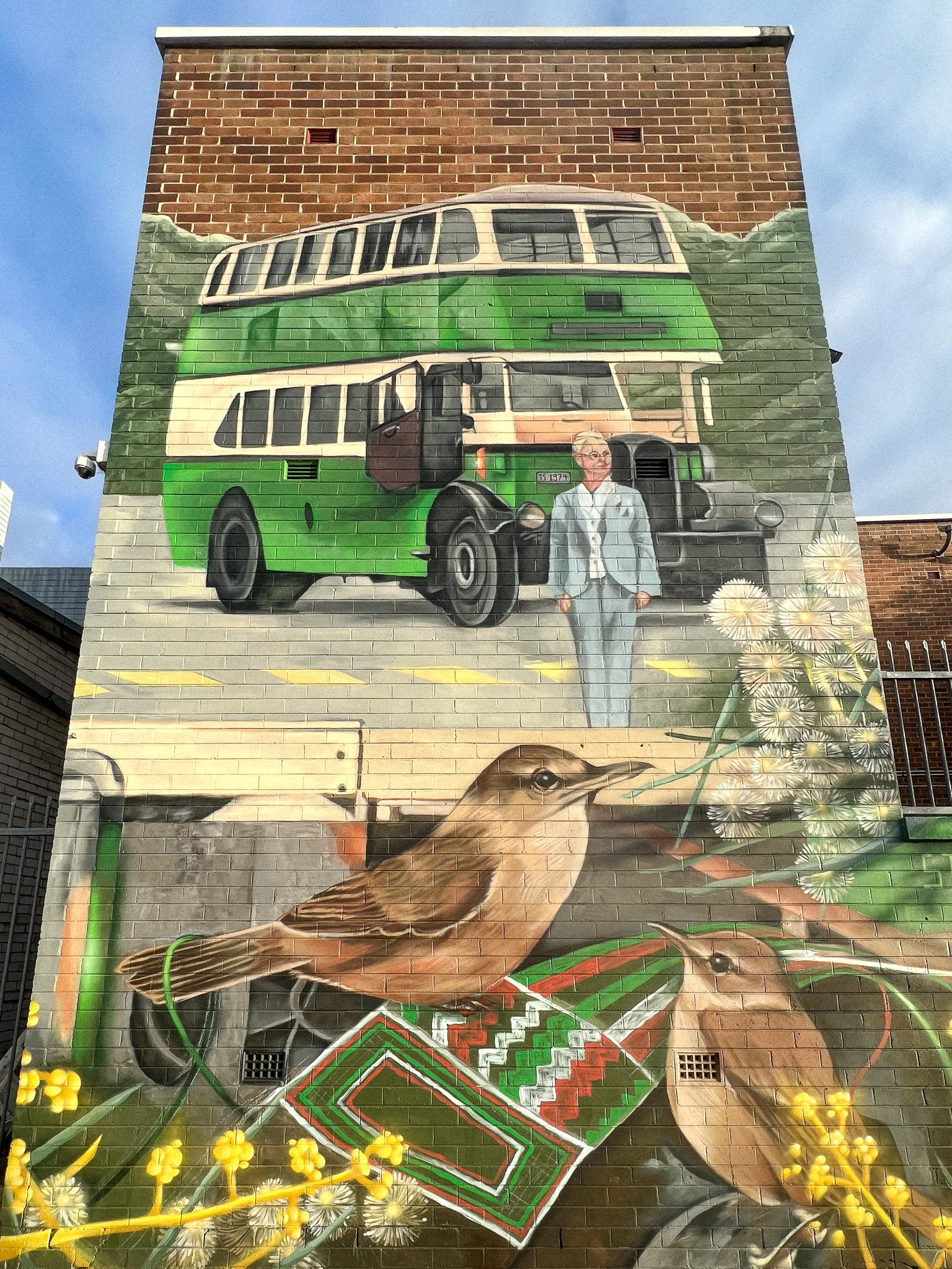 Mural of double decker bus and Australian Reed Warblers