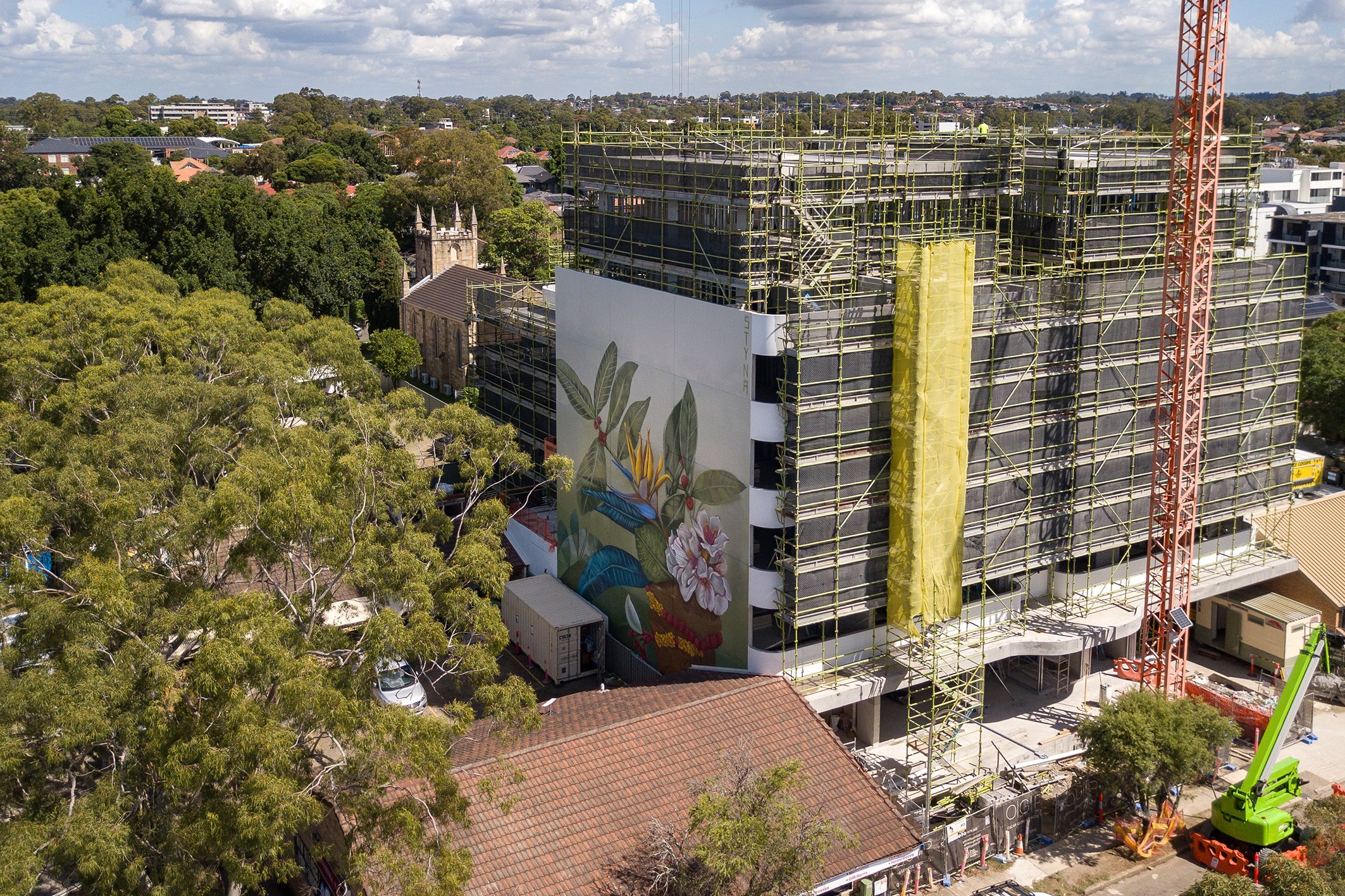 Still life, botanical mural painted on construction building by Christina Huynh STYNA for Oscar George Projects