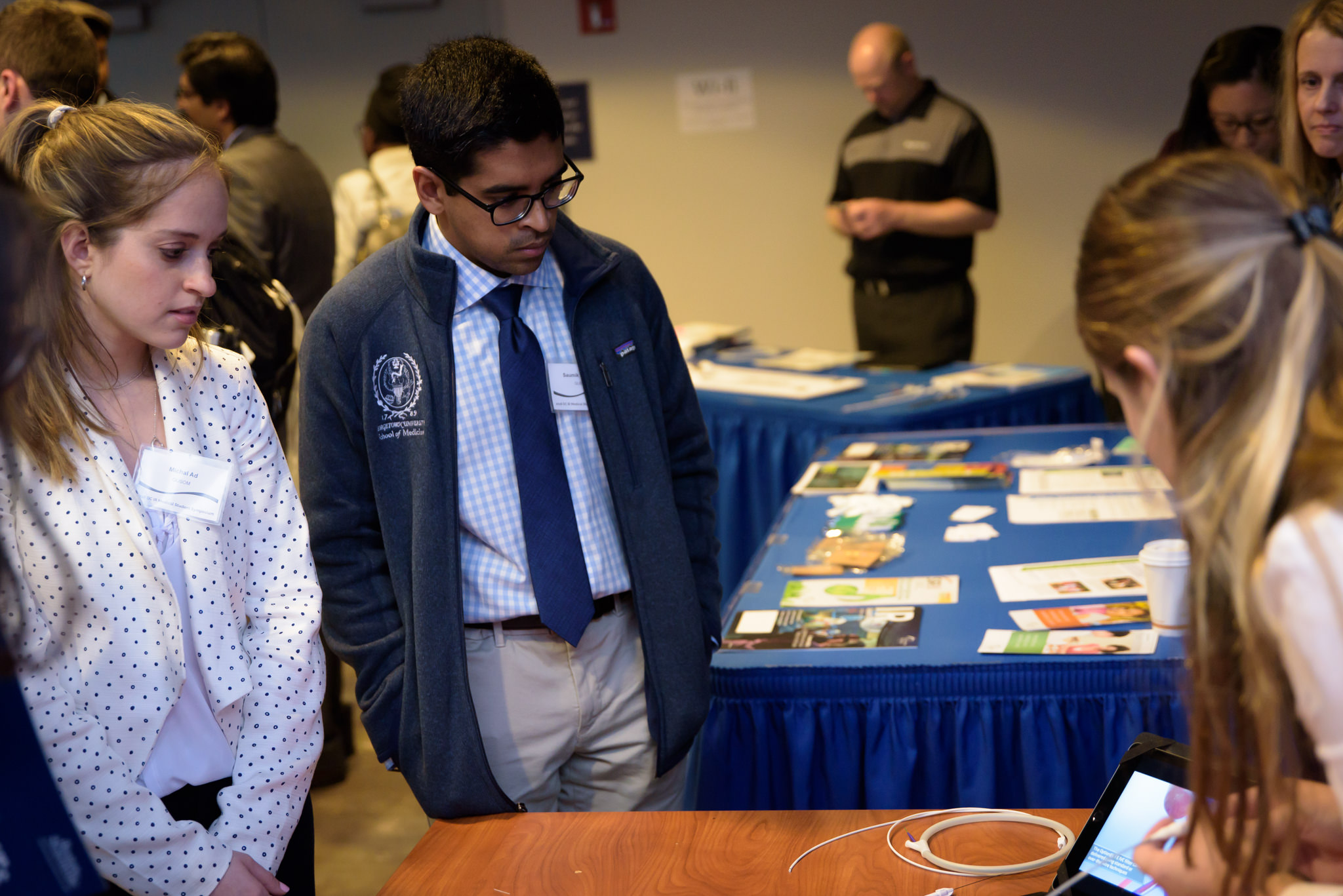  Symposium Planning Committee Members: Michal Ad (left, Georgetown) &amp; Saumik Rahman (right, Georgetown) 