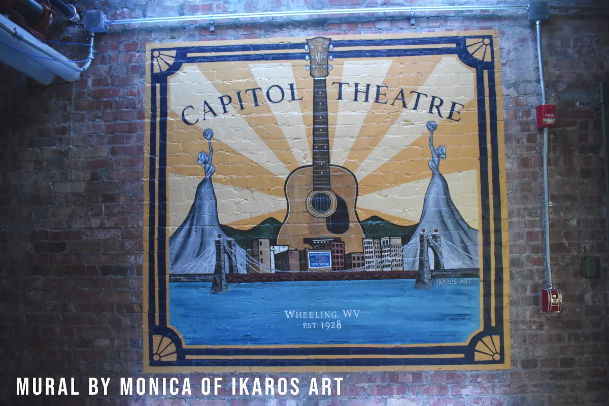 Capitol Theatre mural created by Monica of IKAROS ART
