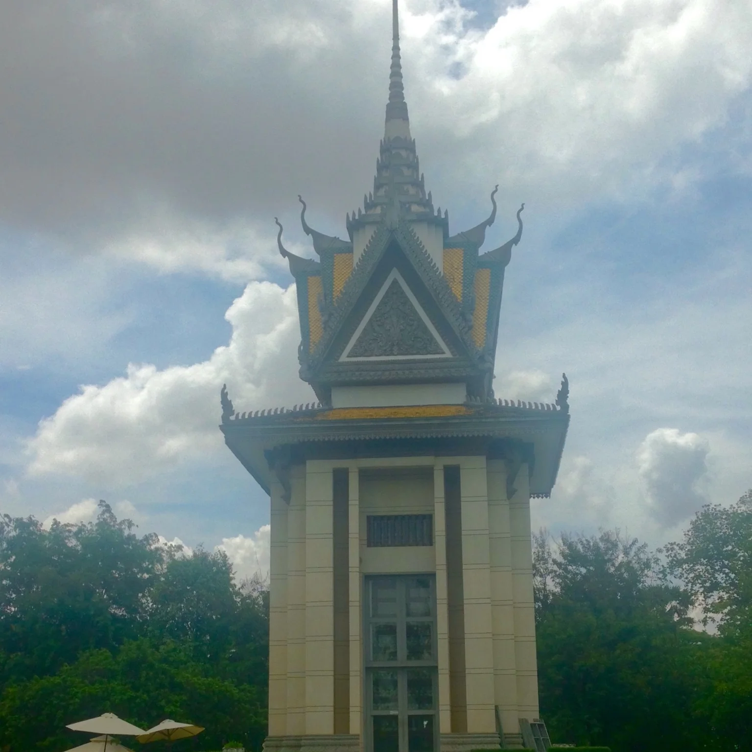 Stupa at Choeng Ek, filled with the skulls of the victims of Khmer Rouge