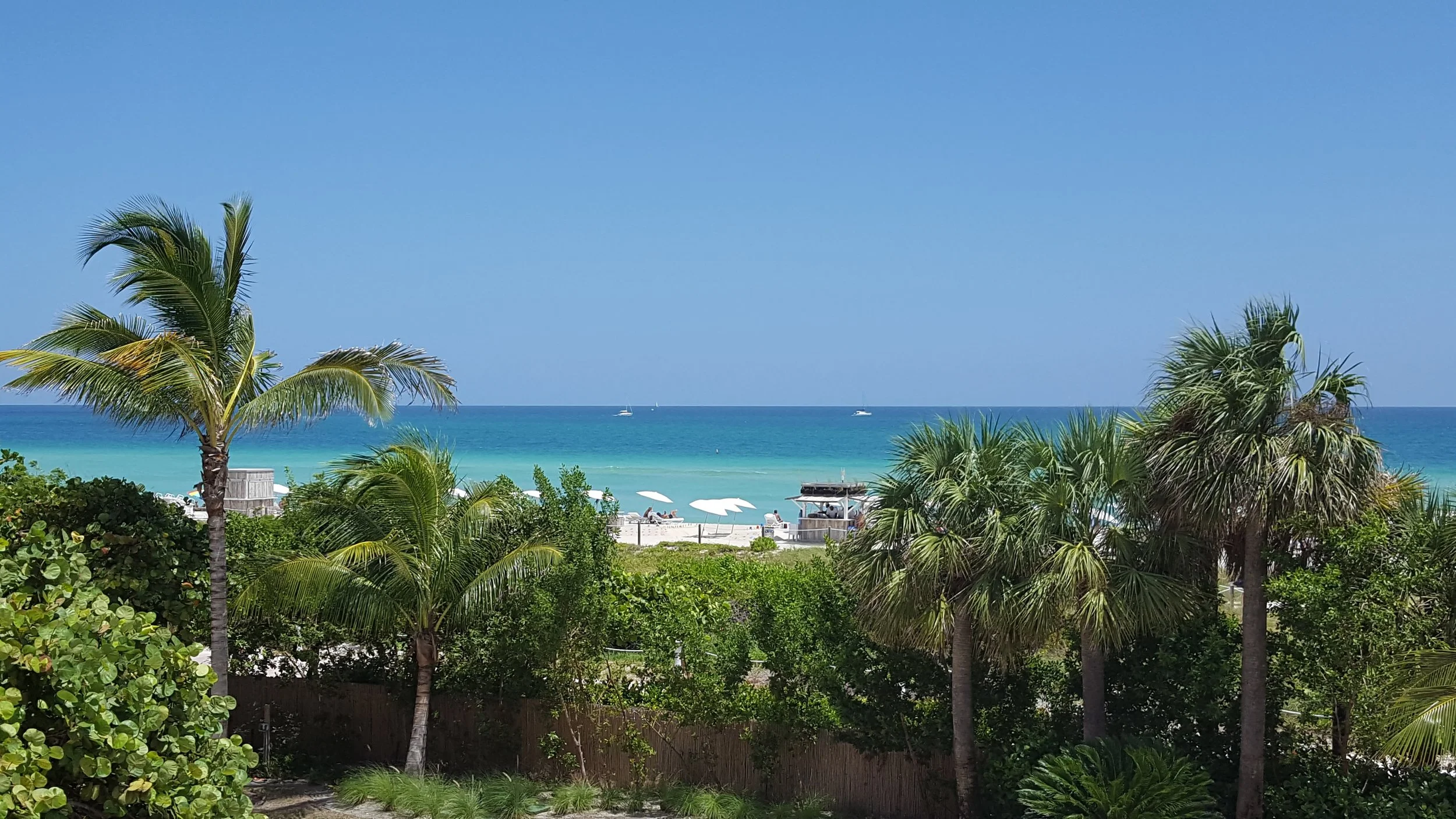 Looking down on the beach from the pool area at the 1 Hotel South Beach