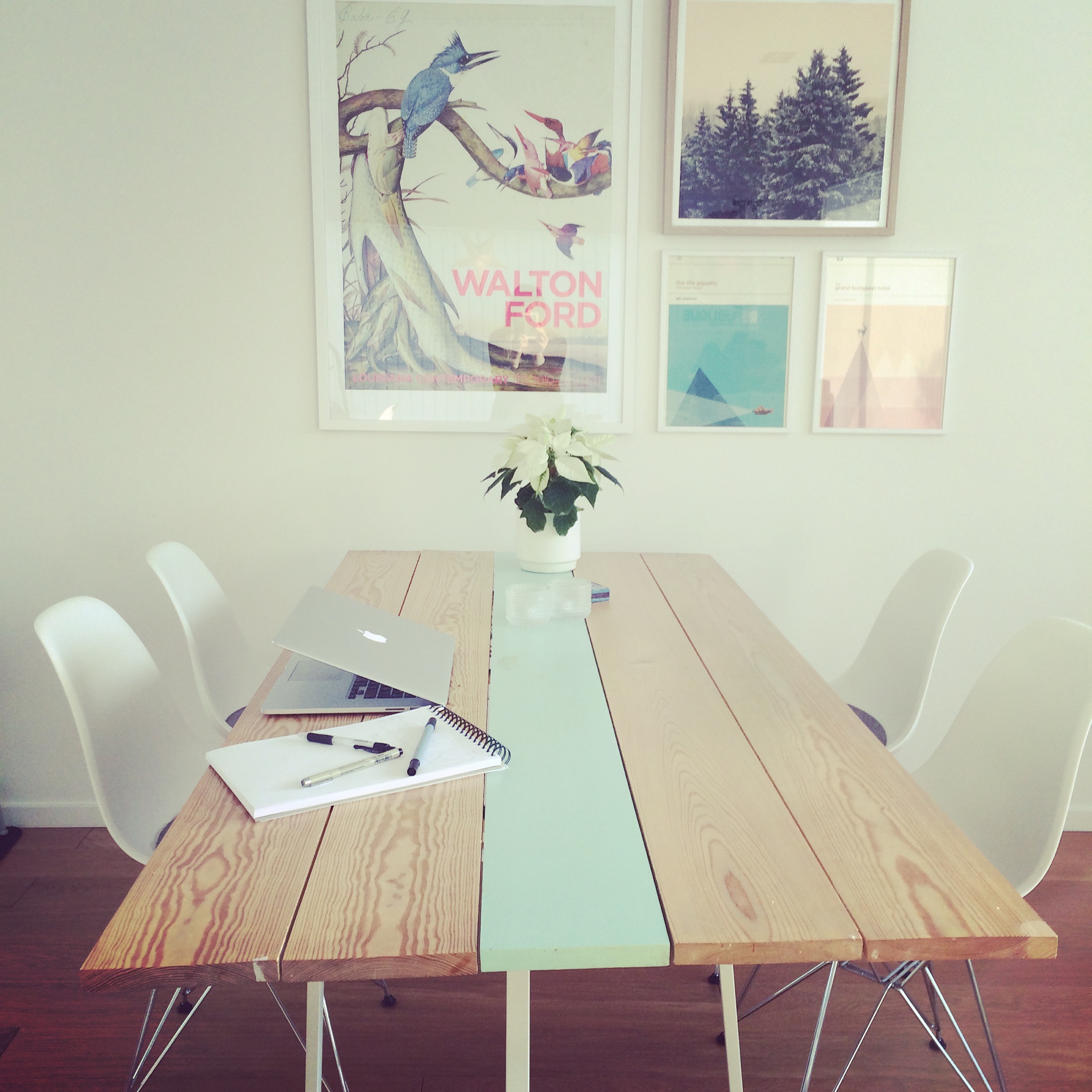 We built the kitchen table ourselves (well, I designed it and Rasmus did the actual building). Chairs are Eames DSR, big poster from danish art museum Louisiana , square forest poster: Thordis Kayma on Society6 , Wes Anderson posters (the Life Aquatic and the Grand Budapest Hotel) by Concepcionstudios on Etsy