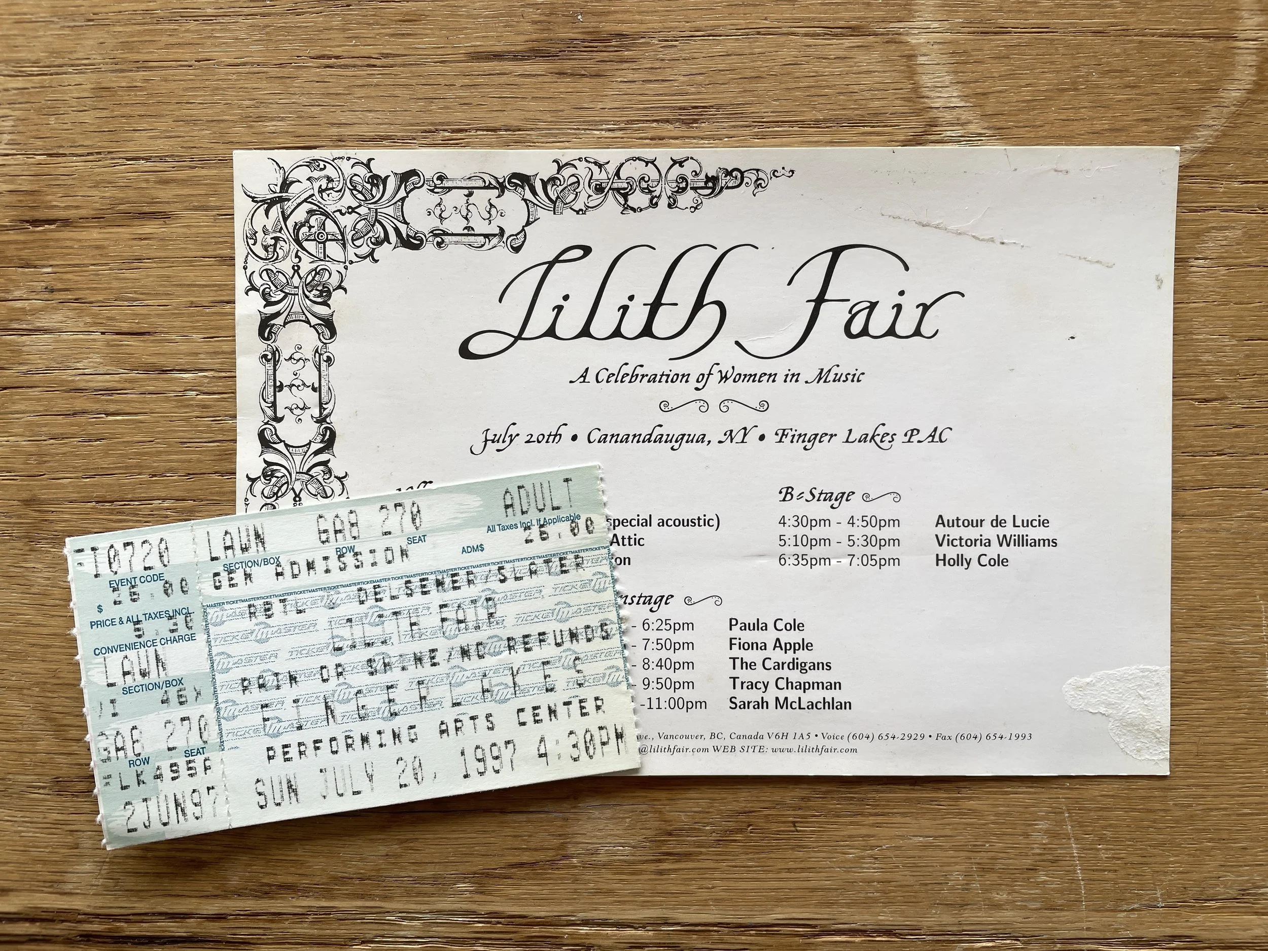 A photo of a ticket and concert handbill from Lilith Fair in 1997
