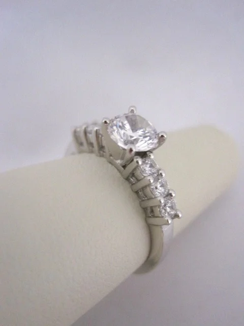 Straight Row Diamond Engagement Ring with Airline in Sides