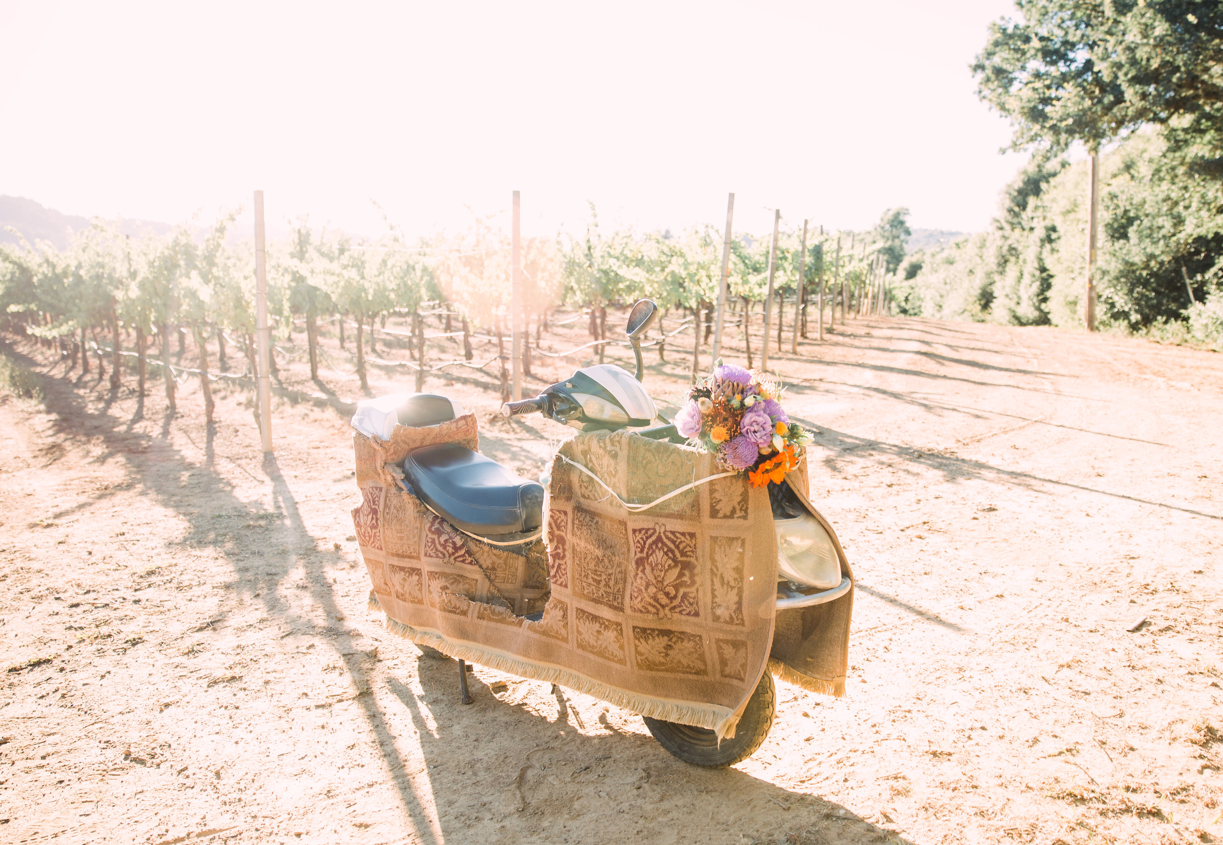 Their beloved “Scoot Scoot” which has seen many an adventure from Burning Man to, well zooming around the Vineyards on their wedding day.