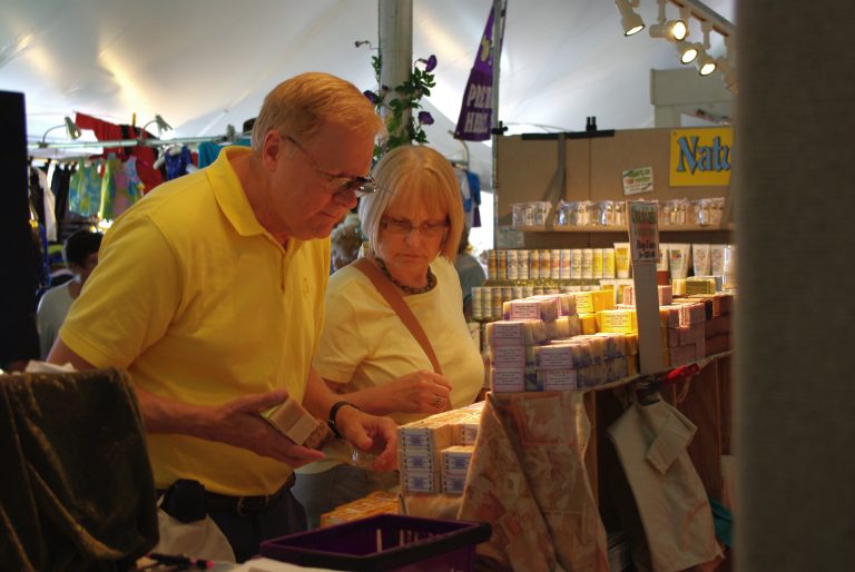 Visitors discussing the wares at the Southern Vermont Art and Craft Festival in Bennington.
