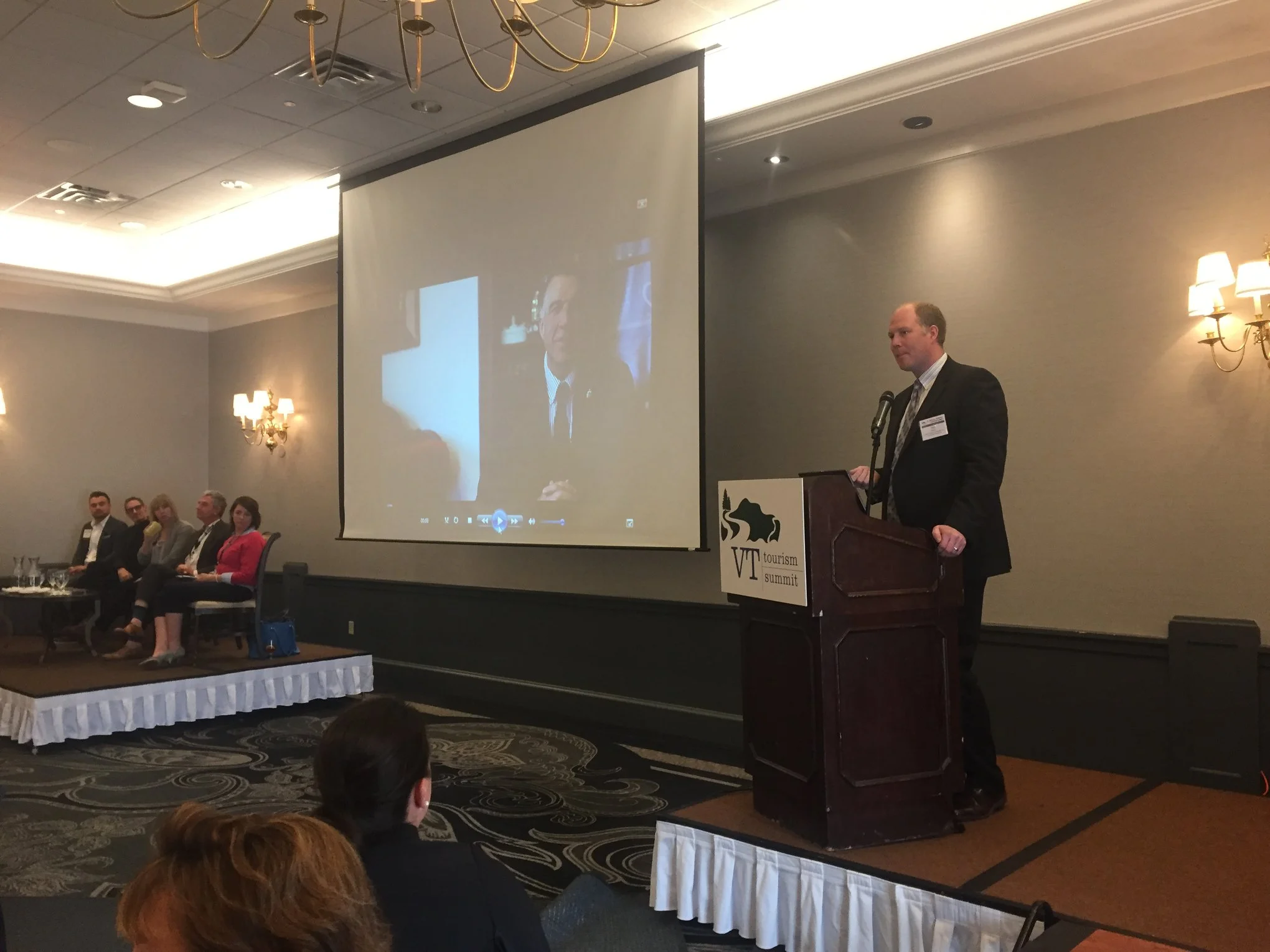 Governor Scott joined via video to welcome the crowd while Deputy Secretary Ted Brady of the Agency of Commerce and Community Development joined.