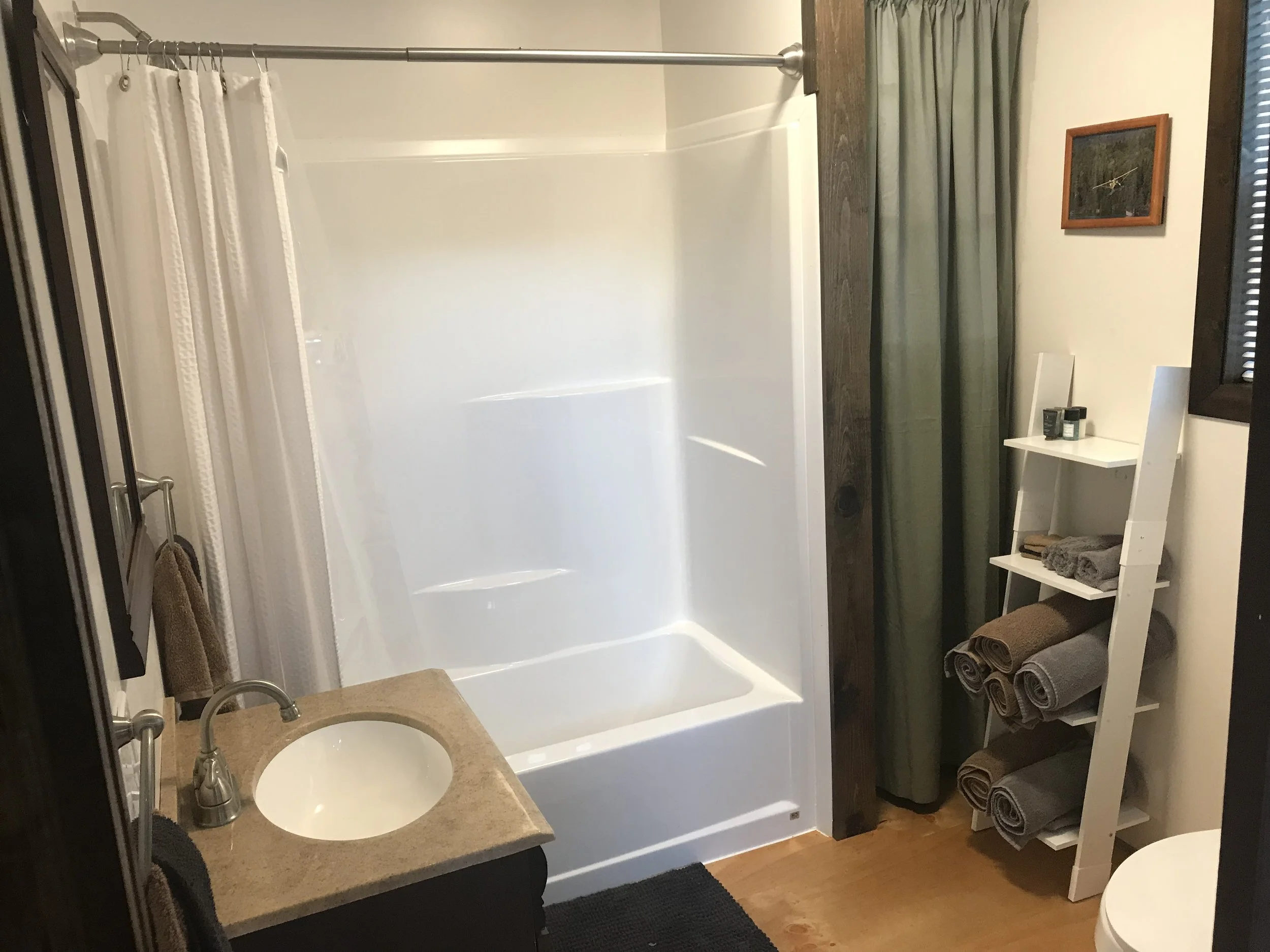 Clean and new bathroom with endless hot water!