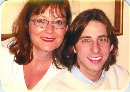 The author with his long locks and his mother, Christmas 2003, during the terrifying George W. Bush presidency. 