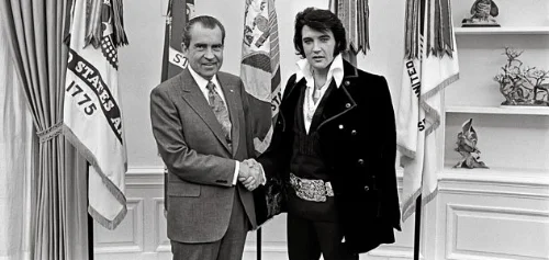 The moment Elvis Presley used his celebrity to persuade President Nixon to make capes the official national fashion accessory. Elvis would die seven years later. Coincidence?
