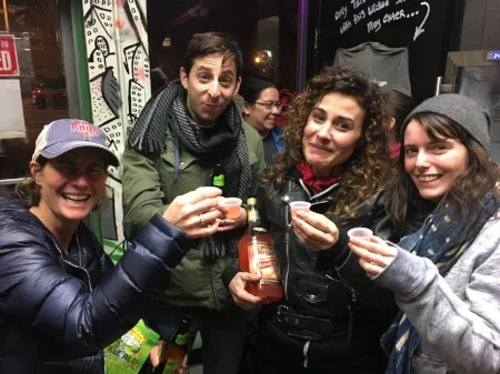 Holly, the author, Nicolette and Jessica at Far East Tacos with their community hooch.