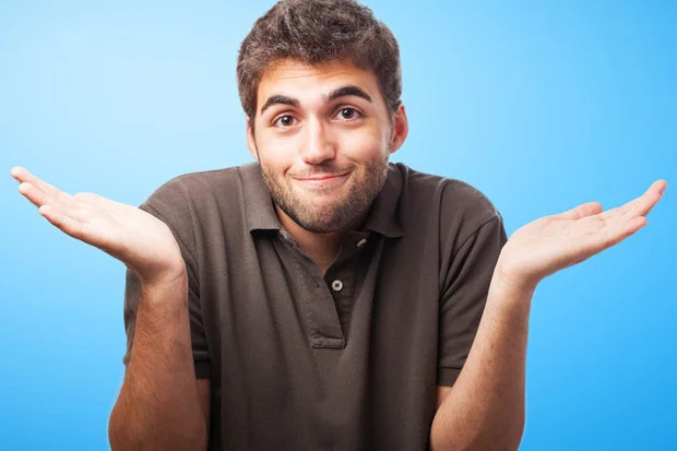 White guy shrugging.