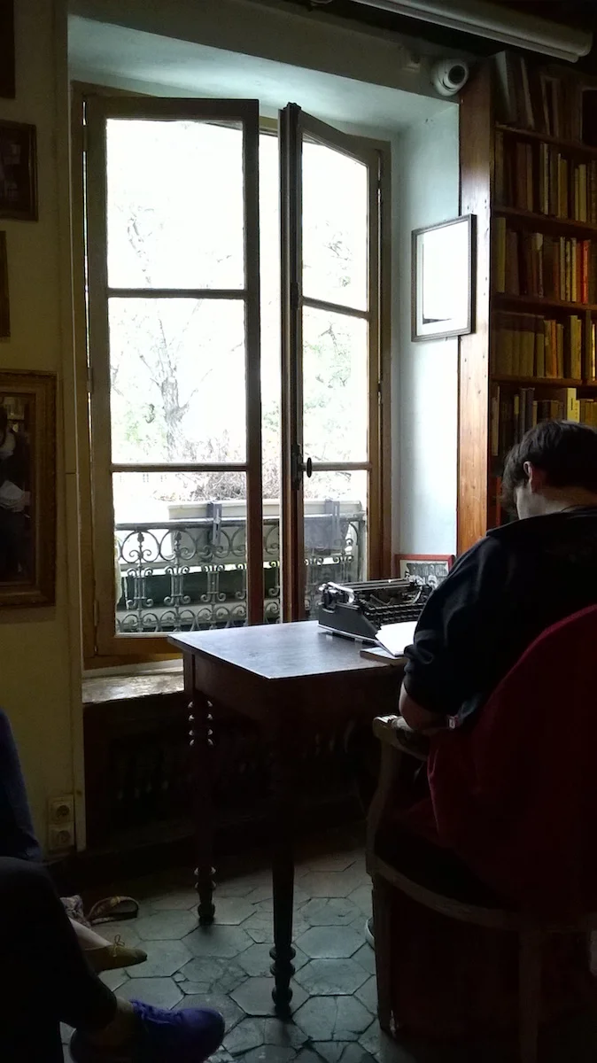 Readers in an upper room at the world famous Shakespeare And Company Bookshop in Paris France.