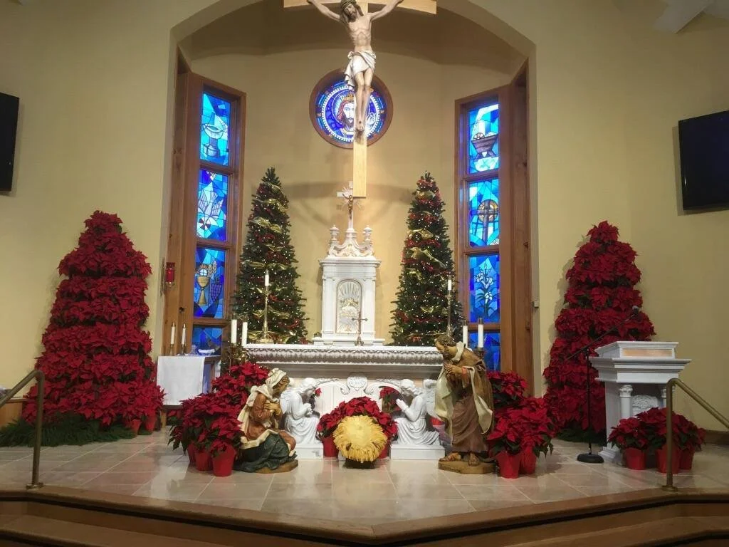 Jesus looks down from his perch on the altar at St. Edward’s where books with magic in them are banned.