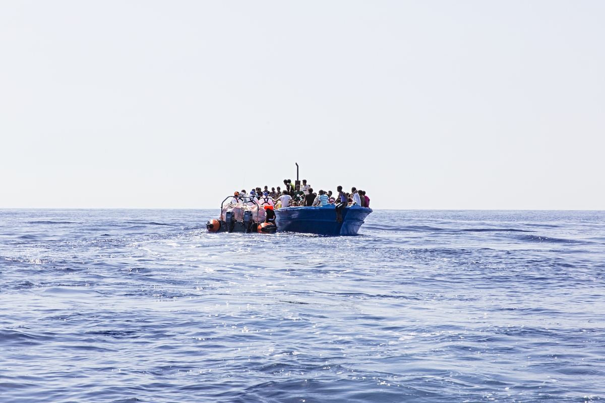  Strait of Sicily, September 2, 2015. Eritrean migrants are seen in their boat as they are about to be rescued 40 miles from the Libyan coasts by a ship hired by MOAS and MSF (Medecines sans Frontieres). The ship named "Phoenix" was patrolling when t