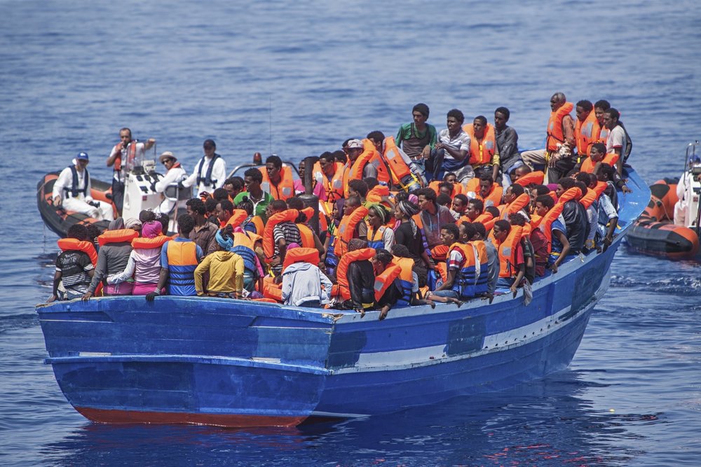  Strait of Sicily, September 2, 2015. Eritrean refugees, who were rescued at sea by a ship named "Phoenix," which was patrolling near the Libya coasts when the two drones found 3 wooden fishing boats. 