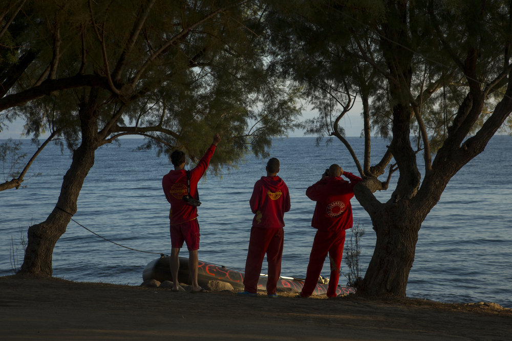  Spanish volunteer lifeguards from Spain look for refugees arriving on the Greek island of Lesbos. 