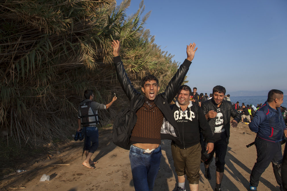  Refugees arrive on the Greek island of Lesbos. 