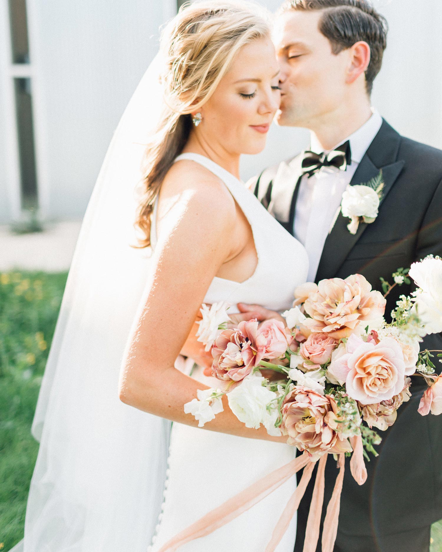 Bride with flowers by Color Theory Collective