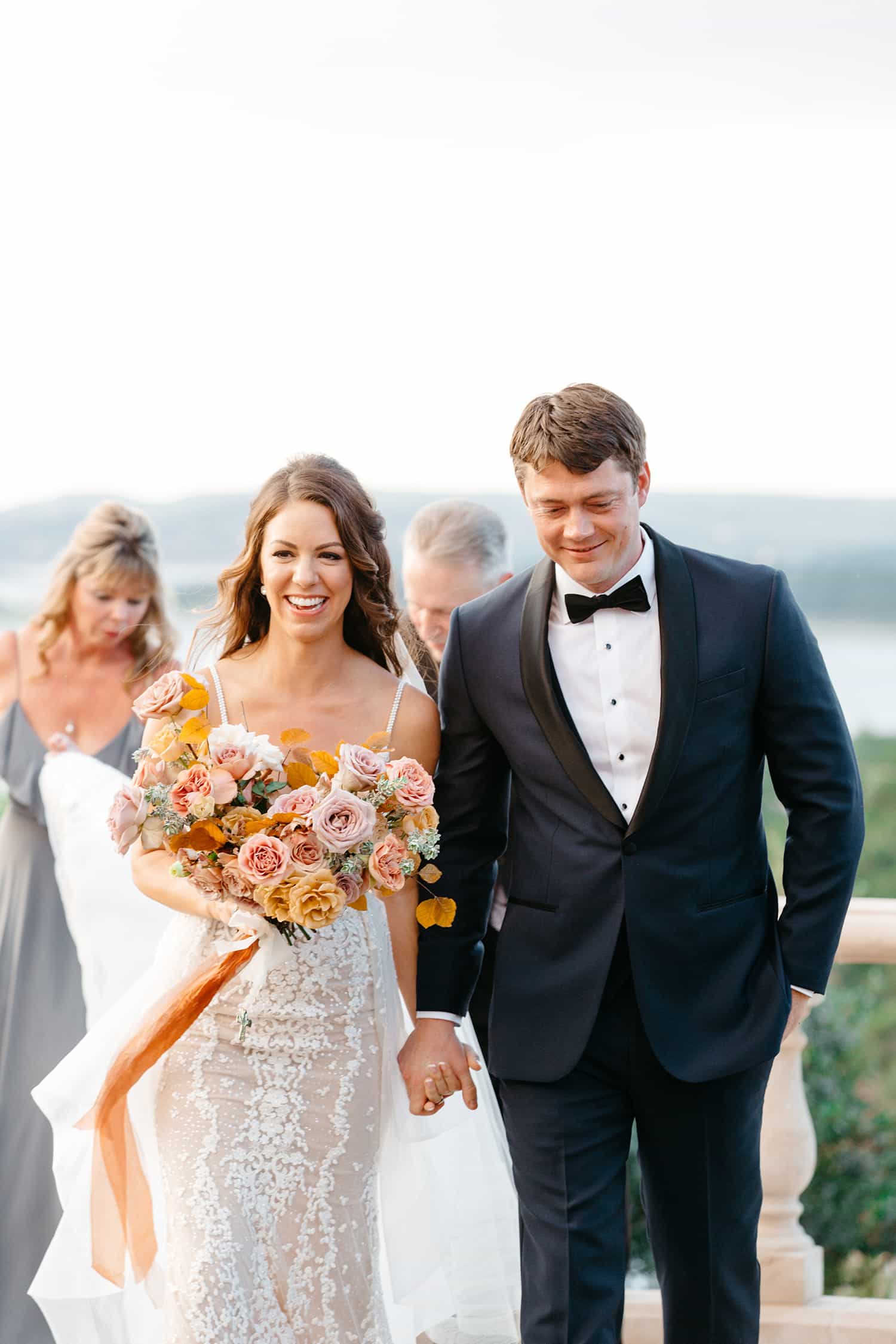Bride with bridal bouquet by Color Theory Collective