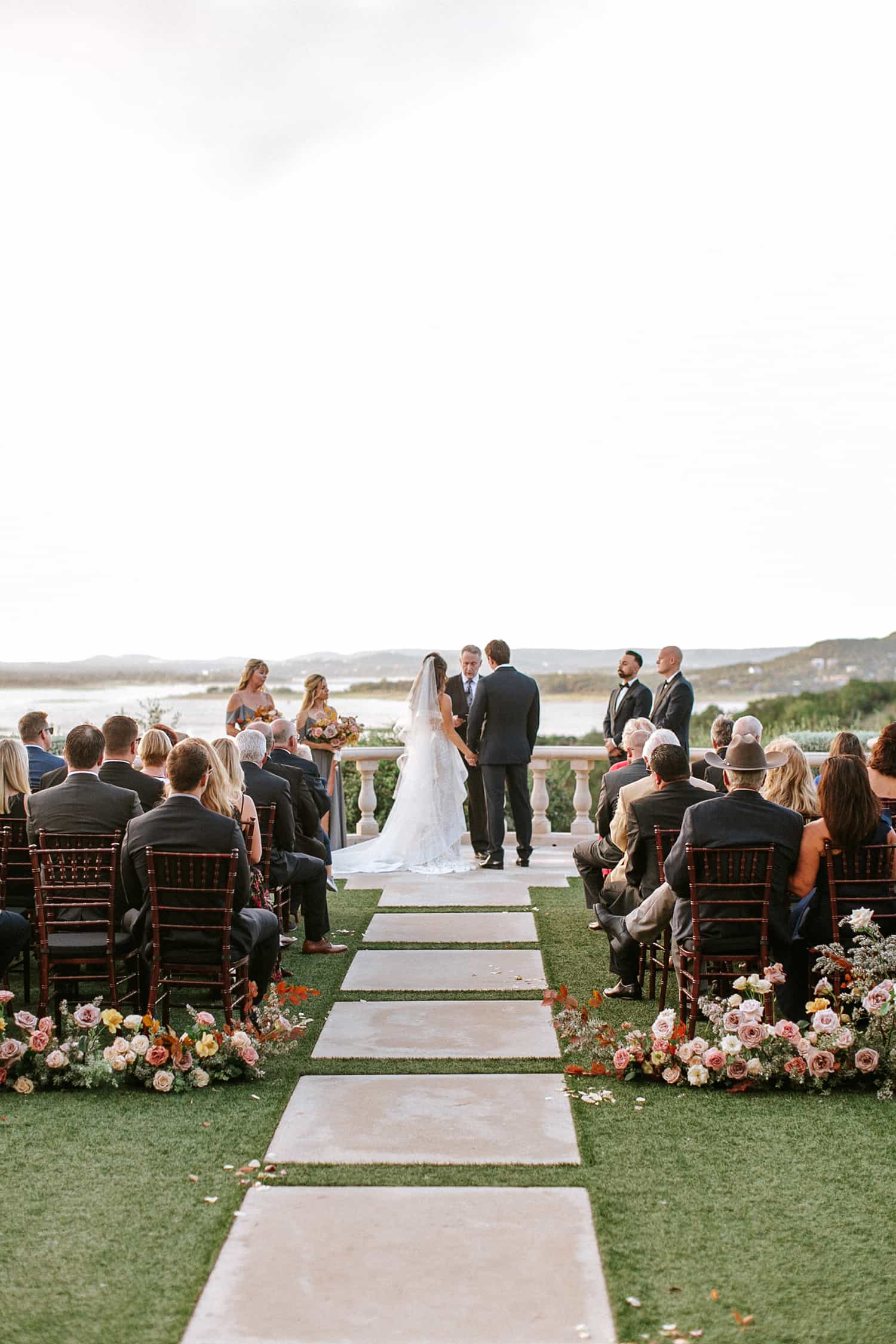 Wedding ceremony flowers by Color Theory Collective