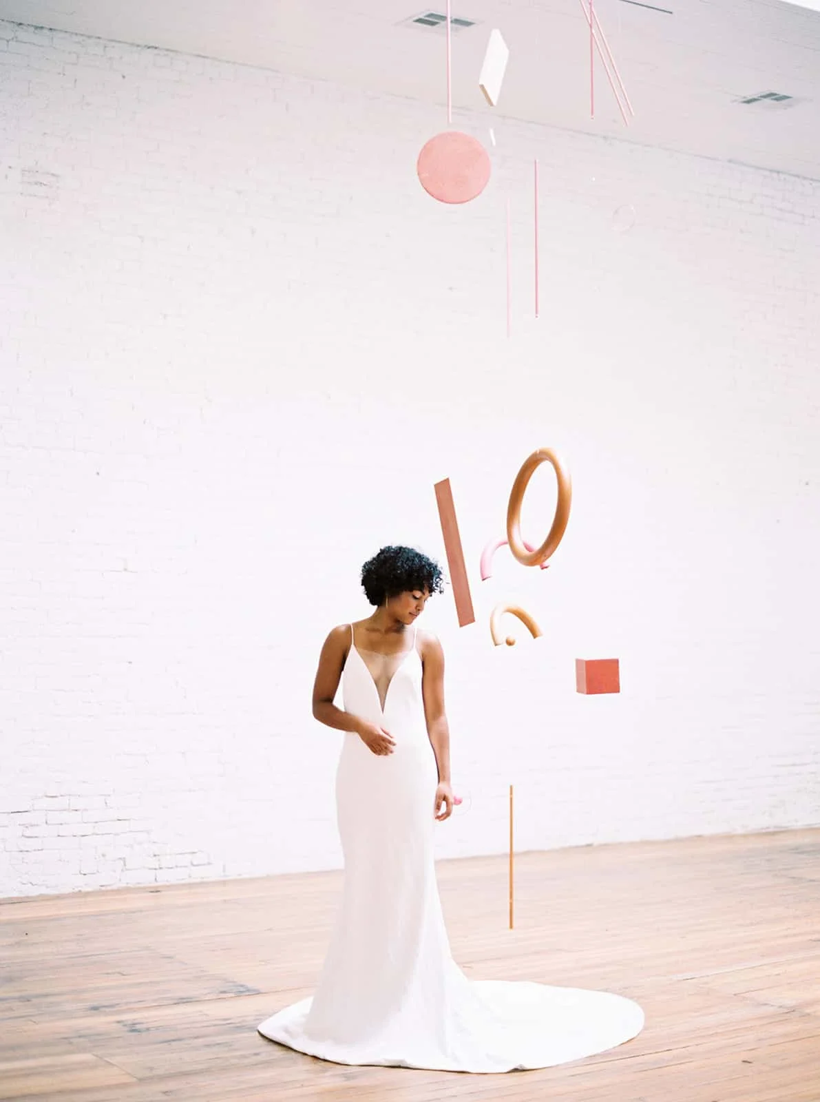 Model and abstract shapes styled by Color Theory Collective