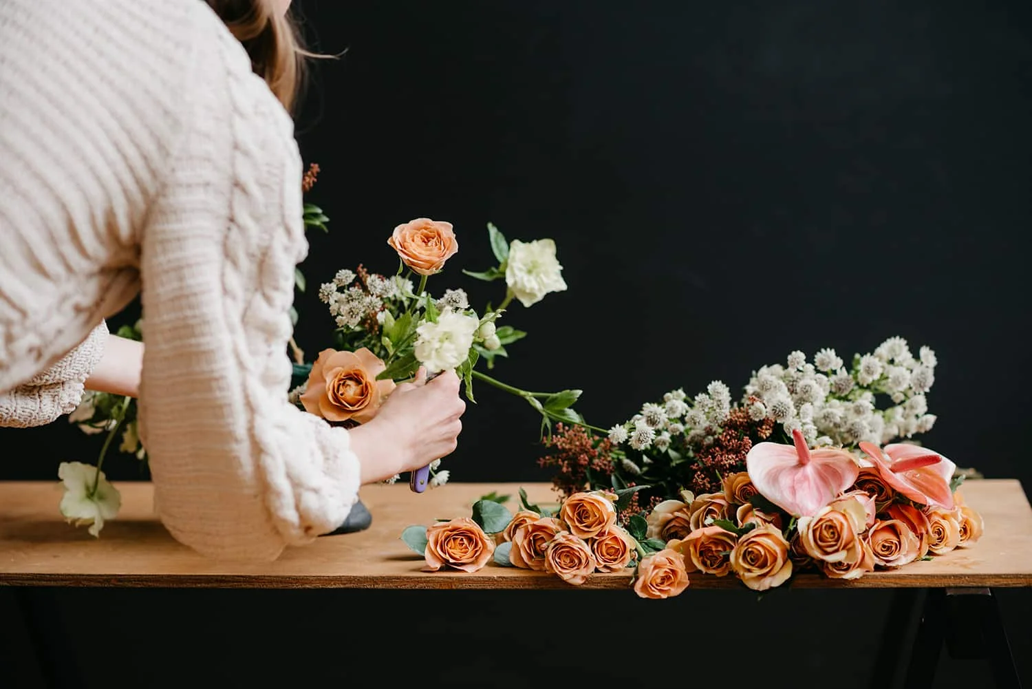 Portland florist demonstrates floral design in area flower shop