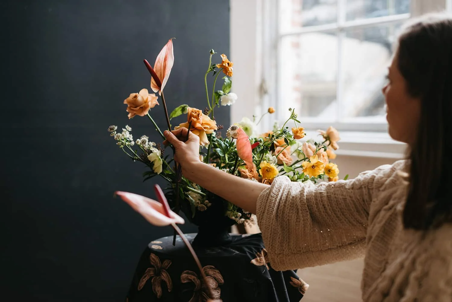 Portland florist arranging a flower display