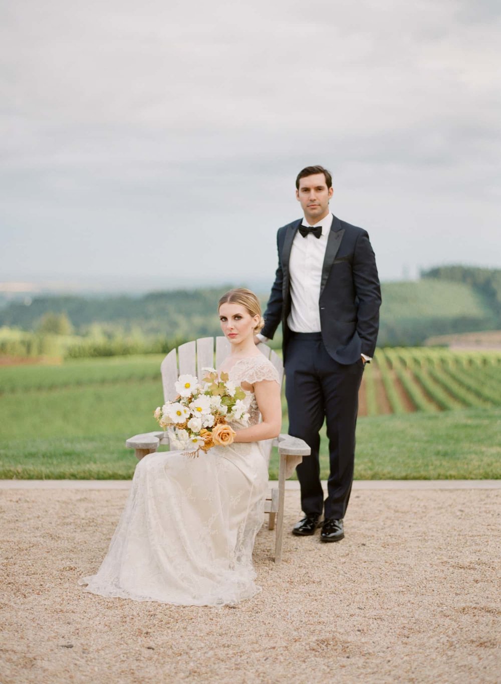 Bride and Groom photographed with flowers